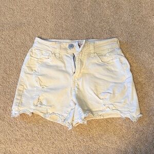 high-rise curvy midi cream distressed shorts